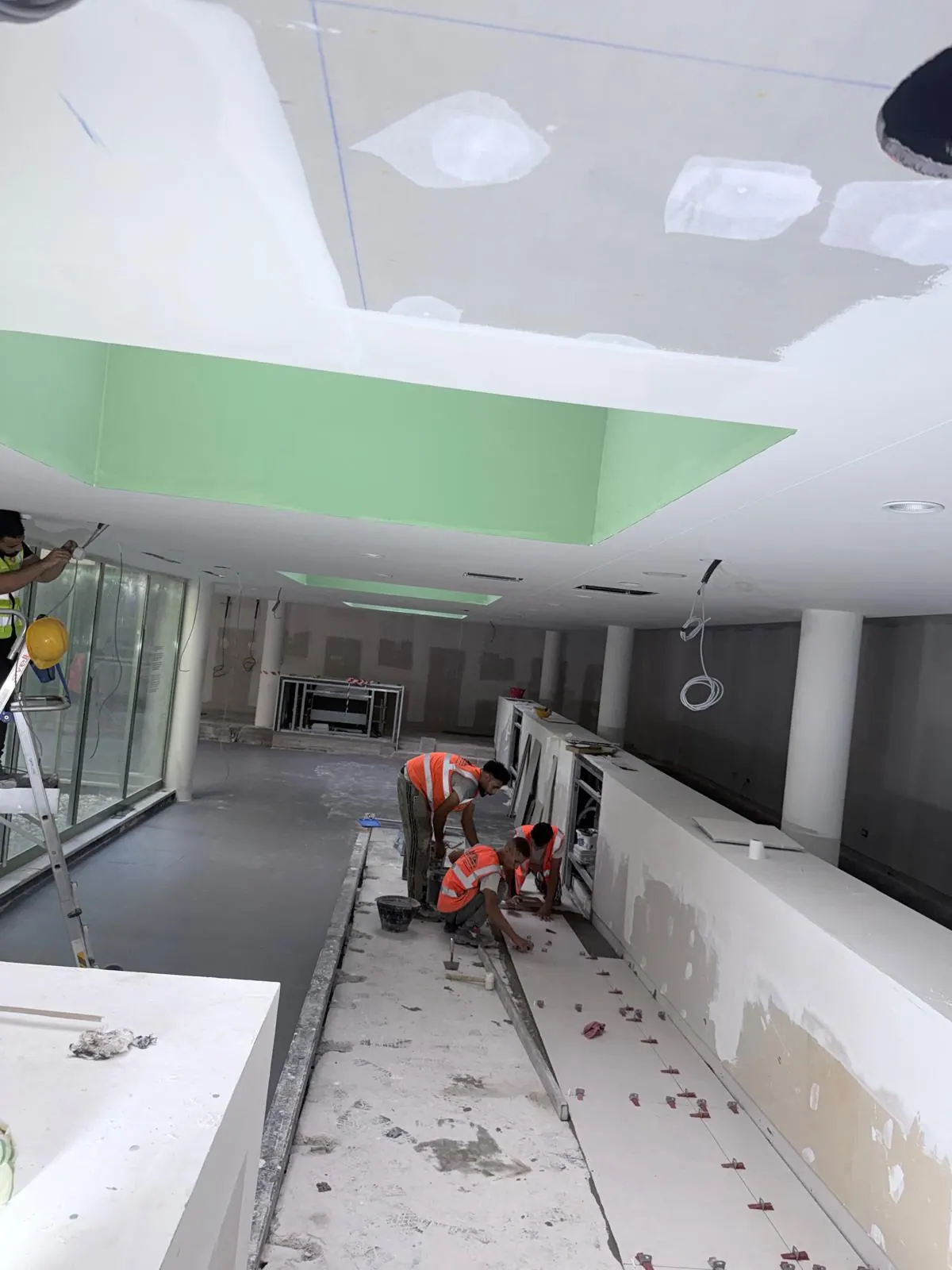 Crews and works on a construction site
